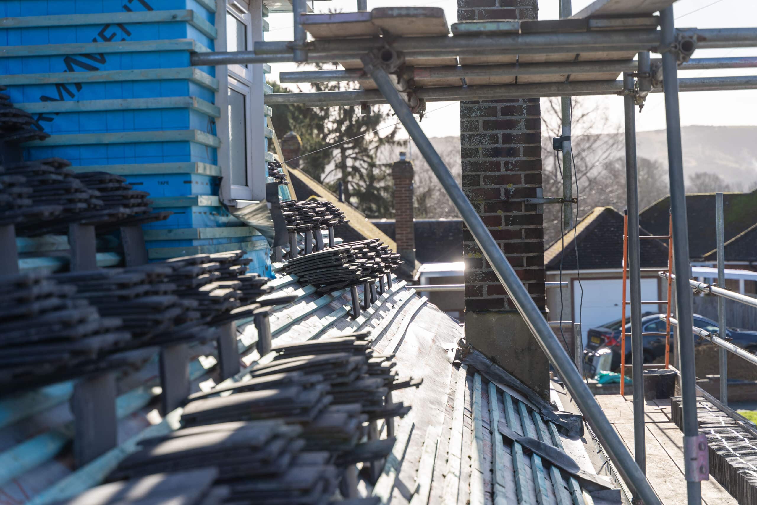 Tile and slate pitched roof project in a Sussex village